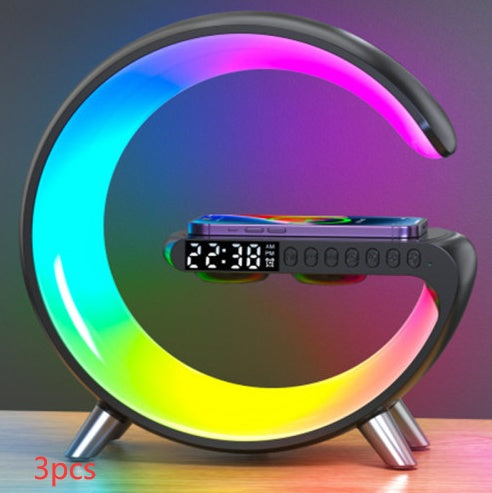 G Shaped LED Lamp Bluetooth speaker with wireless charger and atmosphere lighting, controlled via app for bedroom or home decor.