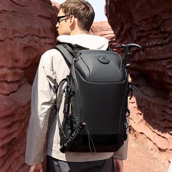 High-capacity multi-functional outdoor adventure backpack with multiple compartments and sturdy straps, ideal for hiking and camping.