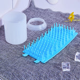 Pet paw cleaner kit with soft brush cup for cleaning pet paws, designed for easy and gentle paw cleaning.