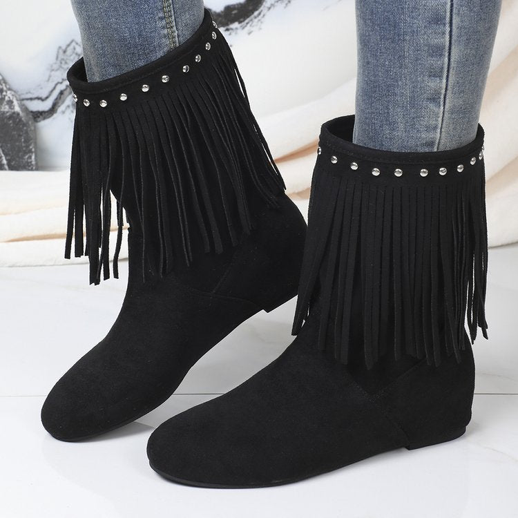 Plus size studded suede tassel boots for women featuring decorative metal studs and tassel details in a stylish design.
