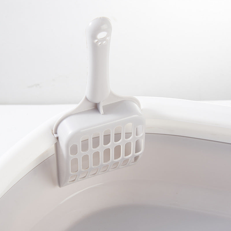 Pet toilet cat litter box with scoop, high-quality anti-splash plastic design for easy cleaning and odor control.