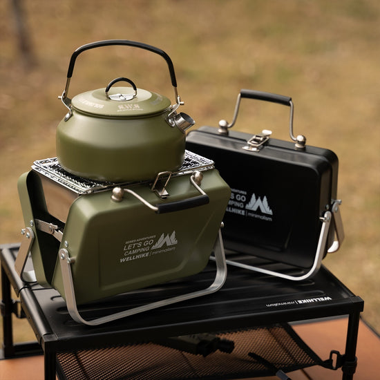 Portable outdoor mini barbecue oven from Bucciato, foldable design with compact size ideal for outdoor grilling and camping.