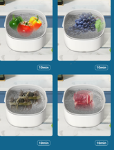 Portable Bucciato fruit and vegetable washing machine for household use, compact design with transparent cleaning chamber.