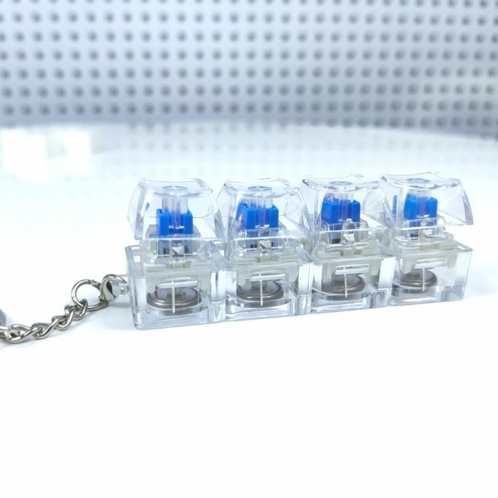 Mechanische Tastatur mit 4 Tasten, elektronisch, leuchtend, transparent, mit höhenverstellbaren Tasten, Druckreduzierung, Anti-Stress-Tastenkappen, Spielzeug, Schulranzenanhänger, Schlüsselanhänger, Dekompressions-Klicker, Gadget, Geschenk