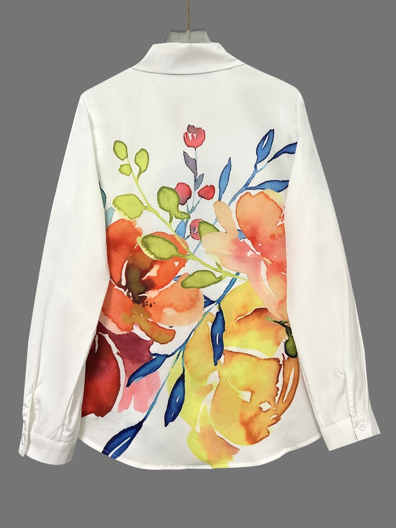 Elegante neue Damenstrickjacke mit floralem Tintenwasch-Print