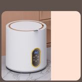 Small mini automatic washing machine for children by Bucciato, compact appliance with control panel and drum for laundry.