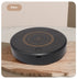 Rechargeable magnetic coffee stirrer coaster from Bucciato, a smart kitchen gadget for automatic beverage stirring.