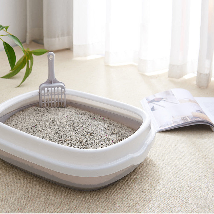 High-quality Bucciato pet toilet and cat litter box with scoop, anti-splash plastic design for easy cleaning and hygiene.
