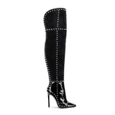 Gold-studded stiletto pointed fashion boots for women, featuring a bold design with explosive gold accents and sleek silhouette.