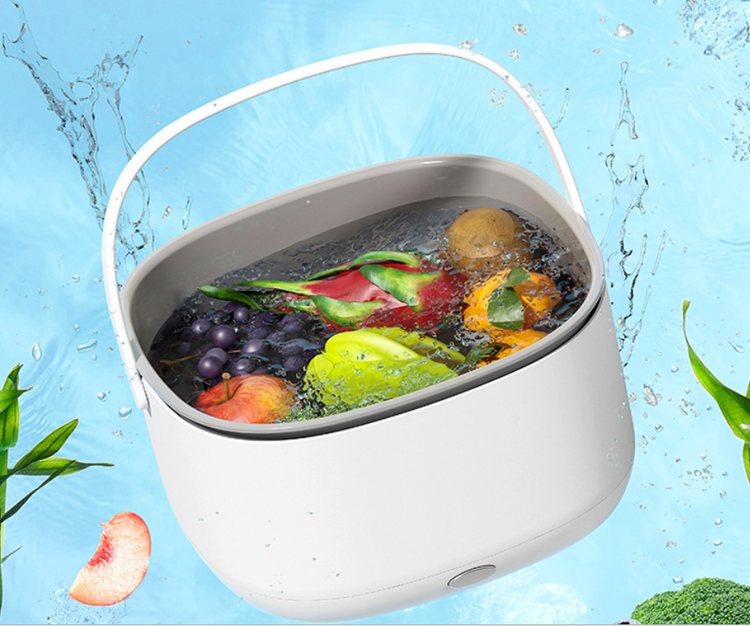 Portable Bucciato fruit and vegetable washing machine with compact design, featuring a basin and control panel for cleaning produce.