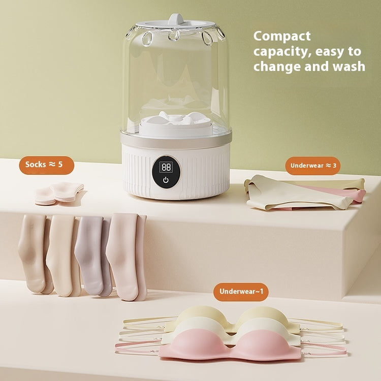 Small wireless underwear washing machine by Bucciato, compact device perfect for cleaning underwear and delicate clothing.