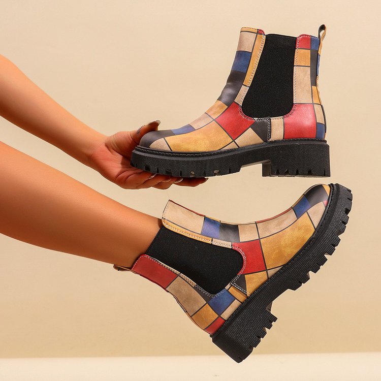 Printed plus-size shaft boots for women featuring bold patterns and stylish design, perfect for fashion-forward outfits.