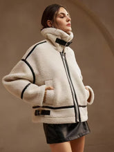 Womens thickened lamb-mohair leather and fur all-in-one biker jacket with quilted details and front zipper closure, stylish and warm.