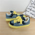 Women’s thick canvas tongue shoes in neutral tones, featuring a comfortable, versatile design with textured fabric and sturdy sole.
