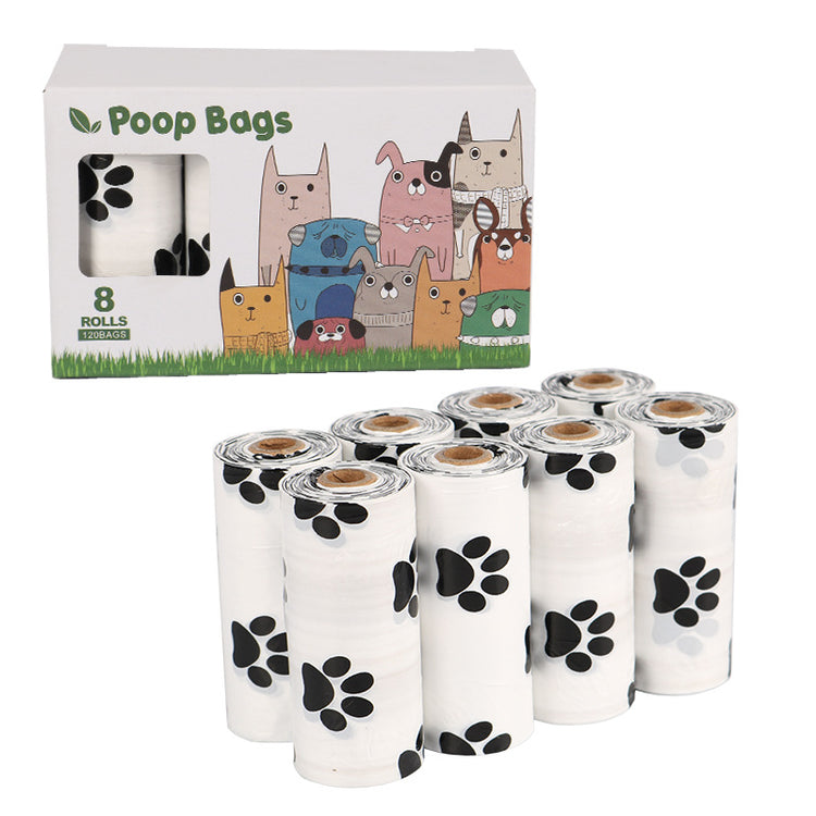 Biodegradable dog poop bags from Bucciato, pet cleaning supplies for waste disposal, displayed in a natural outdoor setting.