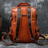 Large capacity cowhide shoulder computer bag with flip design, crafted by Bucciato Multi-Product Store, featuring multiple compartments.