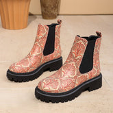 Printed plus-size shaft boots for women with bold patterns, black heels, and stylish design, from Bucciato Multi-Product Store.
