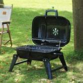 Portable foldable small barbecue grill from Bucciato, with compact design and grilling surface for outdoor cooking.