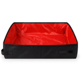 Foldable waterproof pet litter box made of durable Oxford cloth, portable and easy to carry for pets on the go.