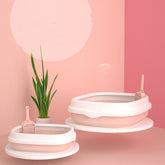 High-quality Pet Toilet Cat Litter Box with scoop, anti-splash plastic design for cats and small dogs, durable and easy to clean.