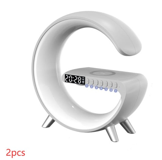 G Shaped LED Lamp Bluetooth speaker with wireless charger, atmospheric lighting, and app control for bedroom and home decor.