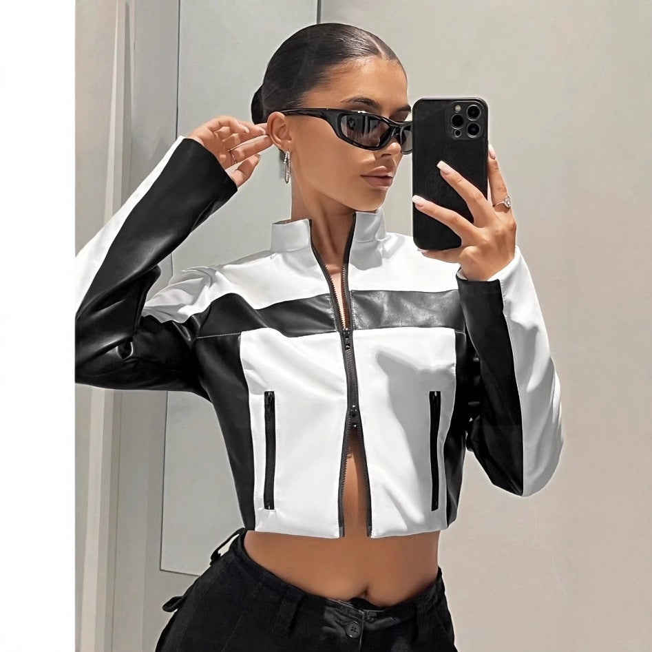 Black and white contrast leather coat for women with zipper closure, slim fit, short length, stylish outerwear from Bucciato.