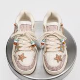Pair of high-end platform sneakers with star pattern from Bucciato, designed for couples, featuring a stylish and trendy look.