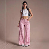 Loose fit wide leg denim jeans for women featuring a straight, relaxed silhouette in classic blue wash.