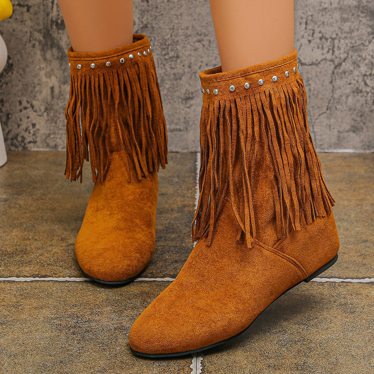 Plus size suede tassel boots for women with studded embellishments, featuring a fashionable design and chunky heel.