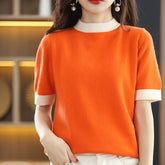 Wool knitted half turtleneck top with short sleeves, loose fit, in neutral tones, stylish and cozy for casual wear.