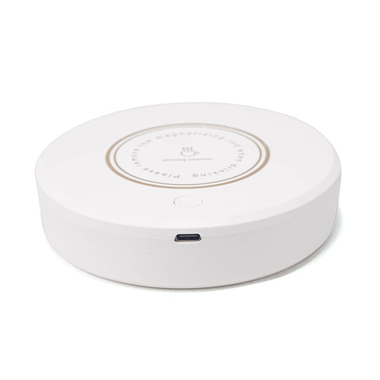 Rechargeable magnetic coffee stirrer coaster from Bucciato, a smart kitchen gadget for automatic beverage stirring.