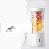Mini electric portable juice machine from Bucciato, showing compact design with blending components and juice container.