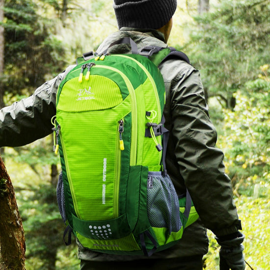 Outdoor waterproof Oxford fabric hiking bag with dual shoulder straps, suitable for trekking, travel, and outdoor adventures.