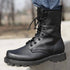 Military steel-toe work safety shoes, tactical combat boots in black leather with rugged soles and reinforced toe protection.