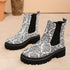 Printed plus-size shaft boots for women by Bucciato, featuring bold print design and knee-high length with chunky heel.