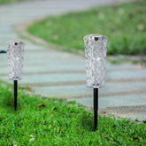 Solar Garden Lamp pair with clear faceted plastic shades, black stakes and top-mounted power buttons